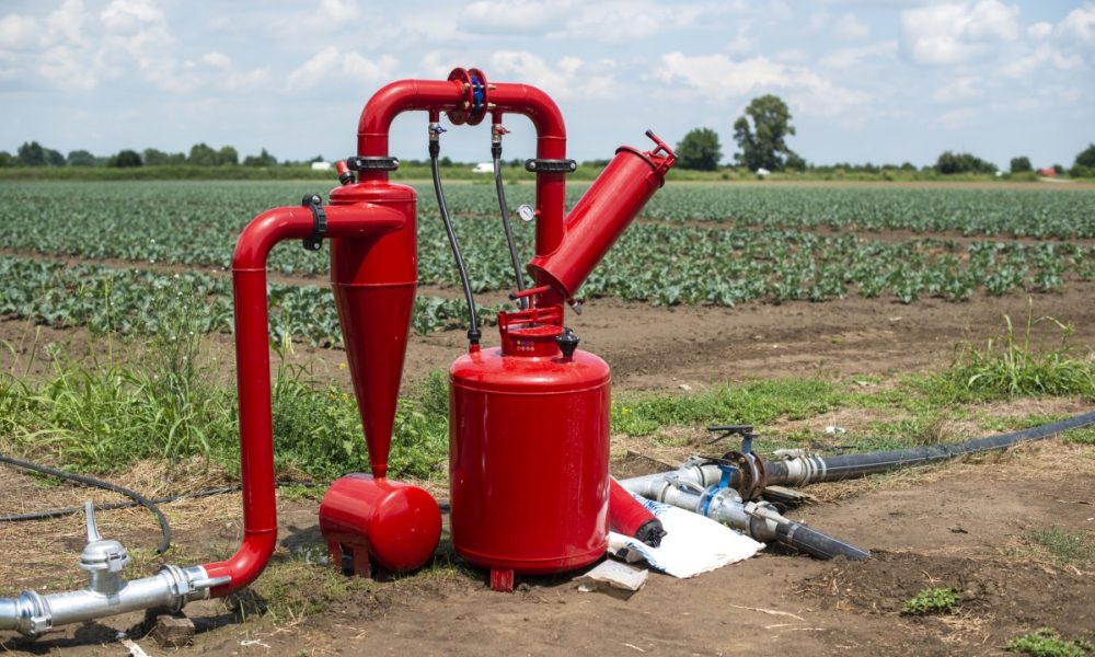 water-pump-and-pipes-on-farmland-2021-09-01-22-05-04-utc (1)